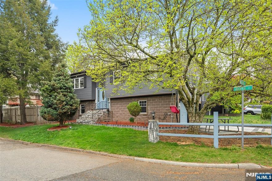 Move right into this beautifully renovated 4-bedroom, 2 full bath bi-level home in the heart of Westwood. Everything has been fully updated, offering a true move-in ready condition. This home features brand new windows, heating system, central air, and hardwood floors throughout. The modern kitchen is equipped with stainless steel appliances and quartz countertops, and both full bathrooms have been tastefully updated. The lower level includes a one-bedroom and a spacious family room, along with a 2-car garage and a fully fenced backyard with patio, perfect for outdoor enjoyment. Ideally located near NJ Transit, downtown shops and restaurants, and offering a convenient commute to Manhattan.