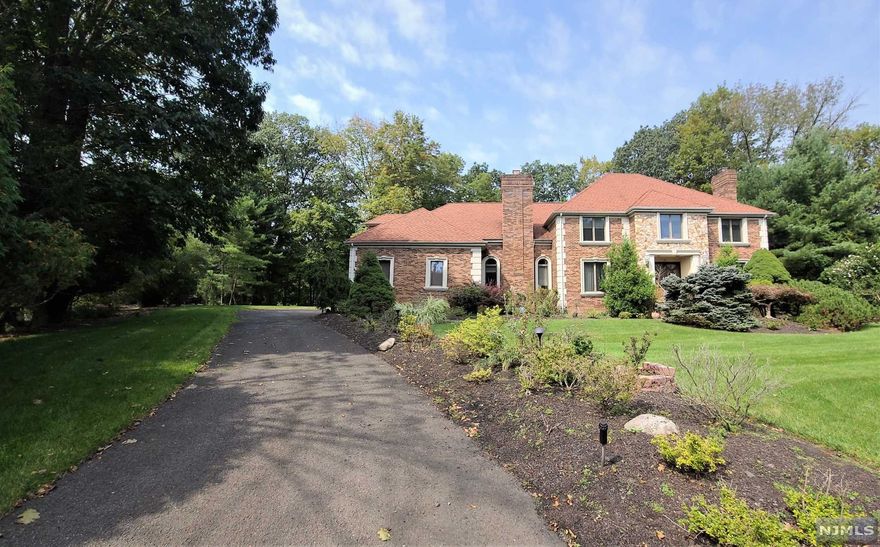 Location! Location! Location! Incredible views of Woods & Saddle River from this spacious center hall colonial. 2 story entrance foyer, Great Room, Formal Living Rm, Formal Dining Room, library/Solarium, 3 fireplaces, 20x40 inground concrete Anthony & Sylvan pool. Grade level finished basement with sliding glass doors to backyard and pool- which includes a Kitchenette for entertaining. Backs up to Borough owned property of woods and streams. Magnificent private changing views from season to season. Located on a quiet cul de sac. 3 car garage. Very small part of back property near stream is in flood plain. Neither house nor pool area are. No flood insurance should be required. House is back on the market. Buyers did not get mortgage. All inspections were done and went well.