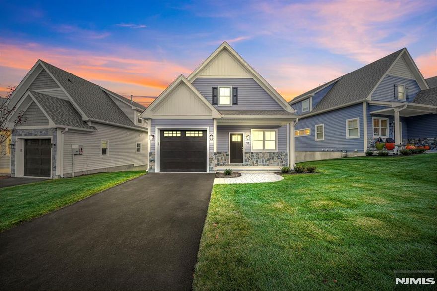 Welcome to Knoll Edge, Morris County's newest 55+ community. Enjoy easy living in this brand-new standalone home featuring 3 bedrooms, 2.5 bathrooms, a finished walkout basement, an attached garage, and serene Rockaway River views.The first floor includes a spacious primary bedroom with an en-suite bath and walk-in closet. The stunning kitchen offers stainless steel appliances and quartz countertops, and opens to a Trex deck overlooking the river. A bright family room, powder room, and laundry room complete the main level. The second floor features two additional bedrooms with large walk-in closets, a full bath, and a versatile loft. The full, finished walkout basement provides abundant open space and access to a patio perfect for additional living or entertaining. Conveniently located with easy access to major highways, bus and train service to NYC, shopping, dining, and Boonton's vibrant downtown. Moments away from Knoll Country Club. ***Use GPS to 424 Vreeland Ave, Boonton***