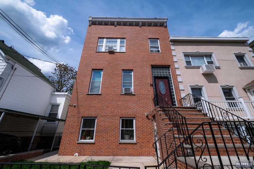 Welcome Home! This 2-family in the desirable Heights section of Jersey City comes equipped with 5 beds, 3 baths, 3 kitchens, and 3 living rooms. Unit 1 is a ground floor/1st floor combo unit. The 1st floor features a brand new kitchen and newer bathroom, as well as a bedroom and living room. There is a bonus LR, Bedroom, Kitchen and Bath on the ground level. Separate entrances. Unit 2 has 3 bedrooms, 1 newer bath, a living room and kitchen. Home has newer brick front as well as newer vinyl siding on the side and back. Ground floor and 1st floor kitchen redone in 2021. 1st floor bathroom redone in 2021. 2nd floor redone in 2019. New floors on ground level redone in 2021. New facade and siding on home in 2016. New appliances in all kitchens. Home has solar panel energy (19 panels) and lease transferrable to new owners. Home being sold as is. Can be delivered vacant with 45-60 day closing.