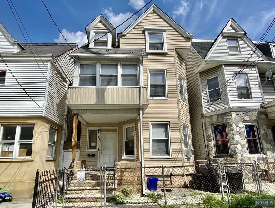 Income producing, legal 3 family home in North Newark with endless possibilities! Centrally located; close to public commuter lines, schools, shopping centers, houses of worship and walking distance mass transit. Basement has full walk-out to a large backyard with perfect for family gatherings. House is being sold strictly "AS IS" with no credits or repairs.