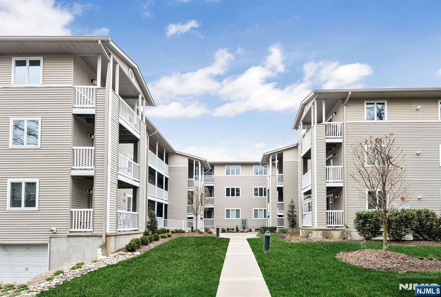 Welcome to Orchard Park! This bright and open first floor condo features 2 bedrooms and 2 renovated bathrooms, situated just a short distance away from the heart of Allendale. The home boasts a functional and inviting layout, including a kitchen equipped with lots of cabinet and counter space, perfect for home cooking and organization. The interior has been further enhanced with renovated bathrooms and the convenience of new, in unit washer and dryer. Step outside to your private balcony, which offers a peaceful view overlooking the central courtyard. For those needing extra space, the property includes a dedicated storage unit in the basement and a 1 car garage #26, supplemented by plenty of open parking spaces for guests. The location is a commuter's dream, positioned just moments from NYC transportation. With local restaurants and shops right around the corner, youâ€™ll have everything you need within this vibrant community.