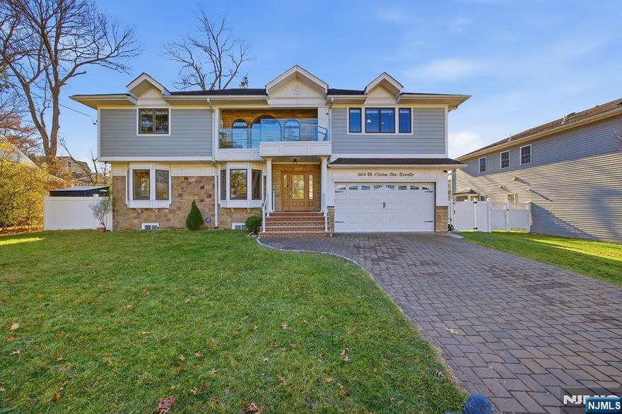 A must-see home in Tenafly! Beautiful 8-year-old modern construction in Tenafly top school district, ideally located near the express bus lane for a quick commute to NYC. This sun-filled south-facing home offers 5 bedrooms and 4.5 baths with approximately 3,800 sq ft of refined living space, featuring Anderson windows, Hardy Plank cement board siding with stone face, and hardwood floors throughout. The main level includes a bright two-story entry foyer, a modern eat-in kitchen, and a first-floor bedroom/office perfect for guests or multigenerational living. The second floor showcases four well-appointed bedrooms, including a luxurious primary suite with high ceilings, a spacious master bath, and a walk-through closet. The property also offers a large, flat, fully fenced backyard, ideal for outdoor living, play, and entertainment.