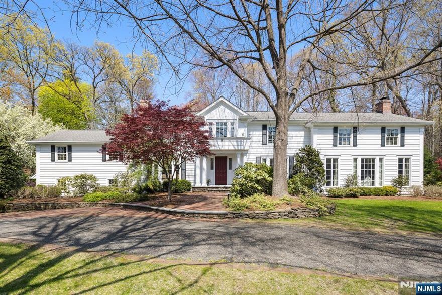 Tremendous Opportunity in Wyckoffâ€™s Prestigious Knolls Section! Welcome to your dream home-ideally located on a quiet cul-de-sac across from scenic Rambaut Lake. This renovated home is approx 5,000 sq. ft. of elegant living space on approx .75 acre, featuring 4 BRs, 3 fbths, and 2 half baths. private backyard oasis, complete w/ a heated saltwater in-ground pool, bluestone patios, covered porch w/wet bar. The main level features A stunning great rm w/fp, elegant dining rm w/fp, Sun-drenched custom Ulrich kitchen w/ expansive windows, 2 PR's,Spacious library w/fp, built-ins, and a wet bar. Upstairs, retreat to your LUX primary suite w/sitting rm, 2 WICs, bath w/ upscale finishes. 3 addl BR's, two fbths. The finished bsmt offers a family room, laundry, storage and steps to garage. Addl feat inc: 3 fireplaces, generator, Ecar charger, Multi-zone heating/AC water softener, Gleaming hardwood floors, circular dw . Come tour today, and fall in love with a home youâ€™ll never want to leave!