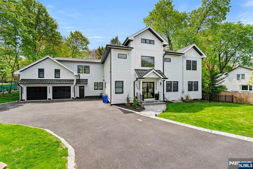 This beautifully crafted 5-bedroom, 4.5-bathroom home offers over 4,500 sq ft of luxury living in one of Bergen Countyâ€™s most desirable towns. The main level features an elegant entertainment room with a cozy fireplace and a formal living roomâ€”ideal for both everyday living and special gatherings. At the heart of the home lies a chef-inspired gourmet kitchen, complete with striking quartz countertops and premium appliances, designed to delight culinary enthusiasts. Upstairs, the spacious primary suite offers a walk-in closet and a tranquil retreat, while a junior suite and two additional bedrooms share a beautifully appointed full bathroom. The home also includes a private in-law suite with its own kitchenette, offering flexibility for guests or multigenerational living. Constructed with durable Hardie and PVC siding, the home combines lasting quality with timeless curb appeal. Additional features include a central vacuum system, integrated sprinkler system, and comprehensive interior and exterior security systems. A perfect blend of style, comfort, and convenienceâ€”located near top-rated schools and just 30 minutes from NYC.