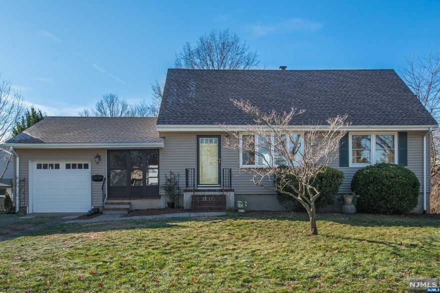 Spacious two-bedroom, one bath cape in one of the most desirable neighborhoods in Clifton. Beautifully maintained home. Light bright, freshly painted rooms, newly renovated kitchen with brand new appliances. Hardwood floors throughout. Breezeway/mudroom is a three-season room with front and back.