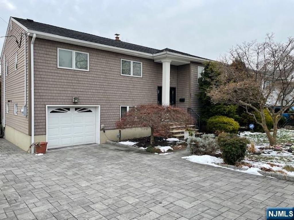 Photo of 82 Herrick Street, East Rutherford, NJ 07073 (MLS # 26000579)