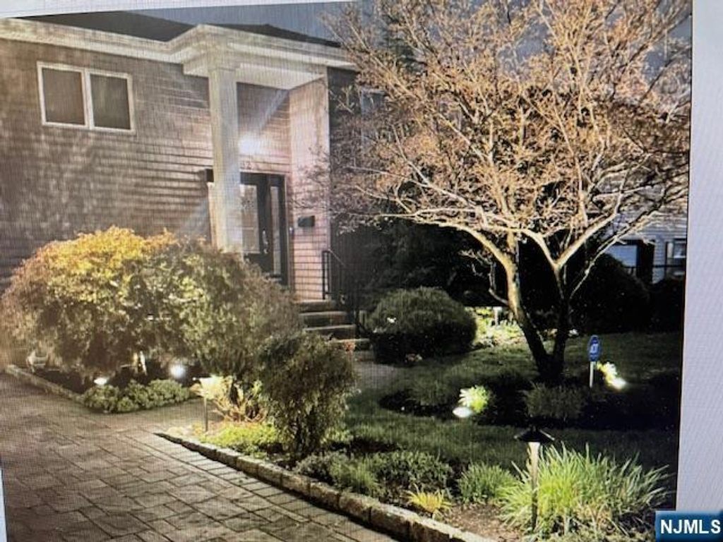 Photo of 82 Herrick Street, East Rutherford, NJ 07073 (MLS # 26000579)