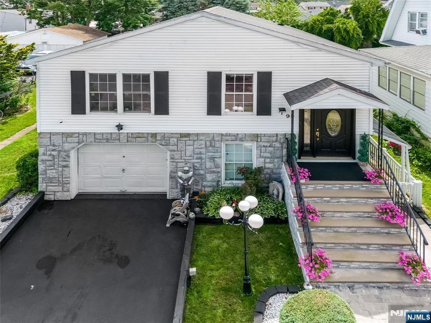Welcome to 95 Burlington Ave, a spacious single-family home located in the heart of Paterson's desirable Hillcrest neighborhood. Boasting 2,664 square feet of living space with central A/C. this well-maintained property offers 4 bedrooms, 3.5 bathrooms, and has an exceptional layout perfect for those seeking room to grow. One of the home's standout features is its fully finished basement, complete with its own private entrance. With a large living area, full bath, and kitchenette, this space functions like a separate unit ideal for multi-generational living, guests, or added income opportunities. Step outside to enjoy an expansive outdoor living area, perfect for relaxing, entertaining, or enjoying warm summer evenings. The property also features a driveway with an attached garage. Located just minutes from local parks, and nearby schools, including public and charter options like School 27, School 19, and the Paterson Charter School for Science & Technology. Commuters will appreciate quick access to major highways and public transportation.