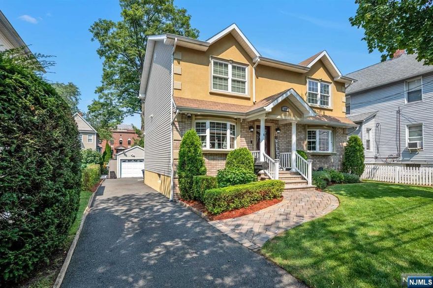 Set in a charming, quiet neighborhood in New Milford near the Oradell border, this stunning center hall colonial offers spacious living with a modern touch. Open Concept main floor layout with LR, DR, and Family Room plus a brand new kitchen with quartz countertops & sleek Samsung smart appliance. Freshly painted walls and gleaming hardwood floors create a bright atmosphere. Upstairs, a loft adds versatile space, perfect for a home office or play area. With 3 generously sized bedrooms and 2.5 baths, there's plenty of room for comfort. The finished basement includes a gym, rec space, and a convenient half bath. Outdoors, the low-maintenance composite deck is perfect for relaxation or gatherings. The one-car garage boasts epoxy-coated floors and smart controls, while a comprehensive 12-camera security system and smart home upgrades enhance convenience. Ideally located near schools, shopping, and transportation, this home is a must see - you will LOVE living here.