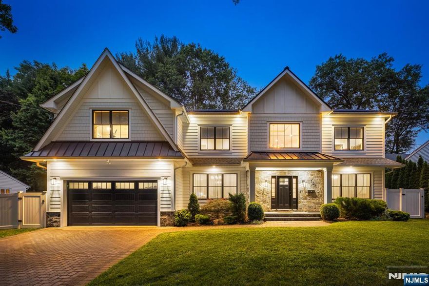 True Pride Showcased in every Detail of this Extraordinary Young Residence spanning 6,300+ sf across all floors perfectly Situated on a Quiet Dead End Street. The White Hardie Plank Exterior is Enhanced with Sleek Black Window Casings and Metal Roof accents, setting the tone for the Designer Finishes found throughout. The Double Height Foyer and Great Room with Gas Fireplace creates a Dramatic Focal Point, while the Gourmet Kitchenâ€”featured in Multiple Home and Interior Design Ads is a Chefâ€™s Dream with Top-Tier Finishes and Custom Lighting. Extensive Trim work, Modern Fixtures, and thoughtful Design Elevate every Corner of the Home. The Finished Basement is made for Entertaining, complete with a Fully Equipped Movie Theater, Entertainment Room with Wet Bar, Full Gym and Full Bath. The yard is perfect for entertaining with a paver patio & room for a pool. Additional amenities include speakers, security cameras, generator & much more. Every Space Reflects Professional Designer Influence and Curated Style. This is the One youâ€™ve Been Waiting forâ€”Style, Space, and Sophistication all in One!