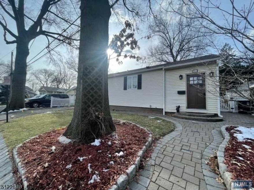 Home sweet home ! Cozy Ranch with open layout and lots of light. Deceiving from the outside this home features 3 BDS,LR,DR, 2 Full baths. Gourmet Kitchen, Hardwood floors, Large backyard in a desirable neighborhood of Clifton,close to NYC trans , shopping, school and park