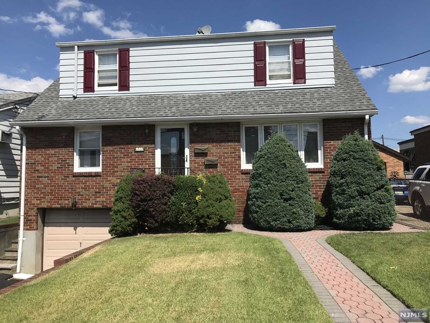 Charming and well maintained 2 family home in a quiet area of North Arlington. 2 bedrooms ech floor. Large sunlit rooms, eat in kitchens, living rooms and 1 bathroom each floor. Ful finished basement with 1/2 bathroom. Fenced large backyard with deck on 1st floor, perfect for entertaining.
