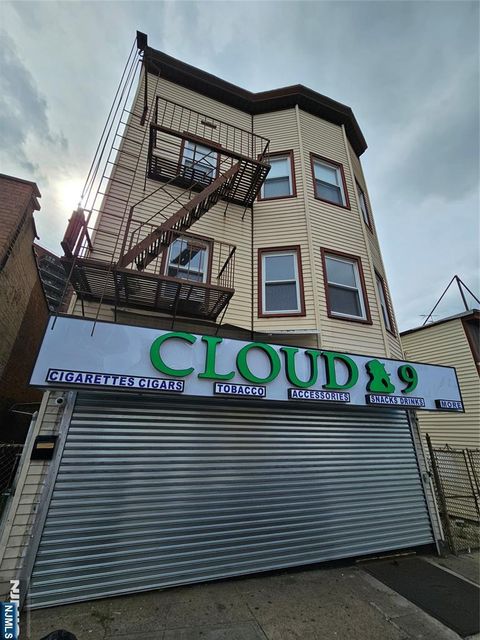Photo of 844 Main St #Apt 2, Paterson, NJ 07503 (MLS # 25041458)