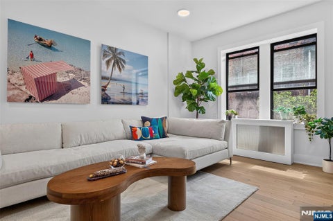 Photo of 107 Kensington Avenue #302, Jersey City, NJ 07304 (MLS # 26026302)