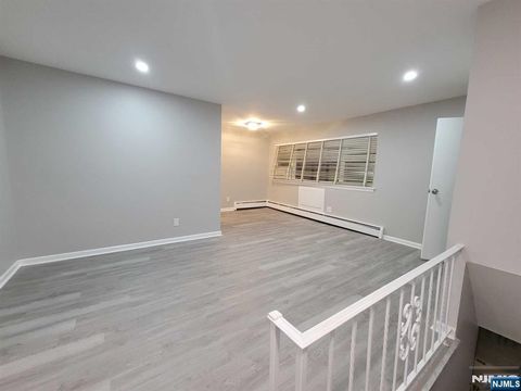 Photo of 121 Pennington Ave #V2, Passaic, NJ 07055 (MLS # 25037478)