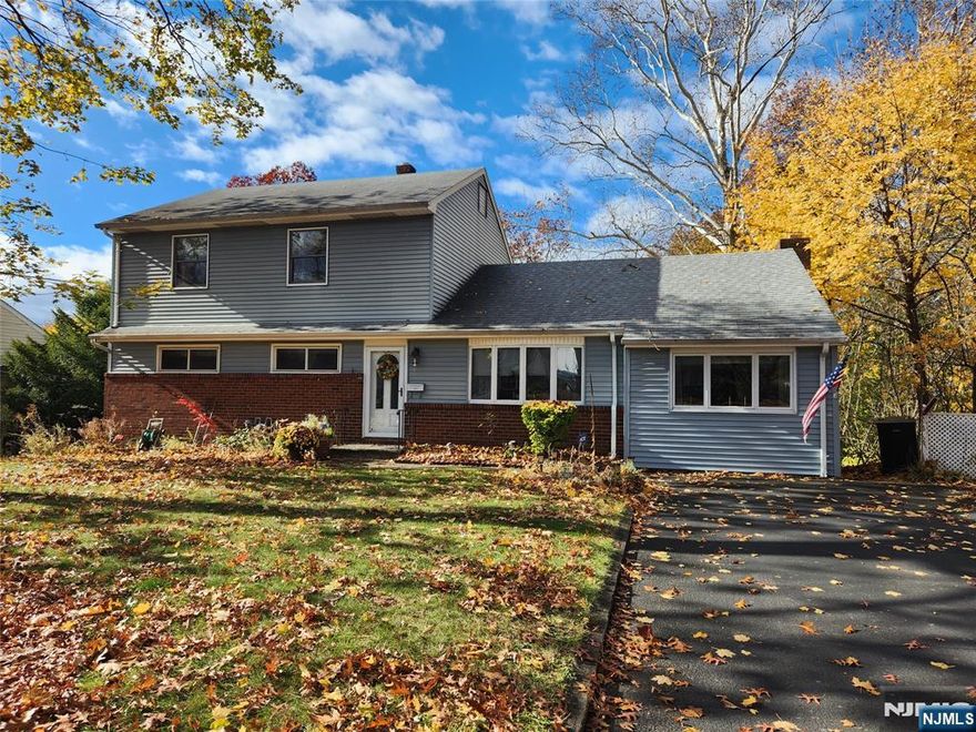 Attention buyers looking to update a spacious 2,128 sf 4 BR 3 Full bth Colonial/Expanded Ranch style home & builders looking to build new home, this is the perfect opportunity! Lovingly cared for home on a 80x120 lot to be sold as-is condition. No known issues. Wonderful location on a quiet street, yet close to schools, multiple houses of worship, shopping & more. Formal LR w/hdwd floors. Formal DR w/FPL and doors to a large deck. Family Room/Office Pretty natural canopy of mature trees adorns the backyard. 1st & 2nd floors each have 2 Bedrooms & a full bath. Lots of closets for storage. Attic access. Basement is full and walk-out w/Large Family Room with a wood-buring stove and sgd to yard. Large gym, laundry room & utilities. Gas furnace approx. 2015.