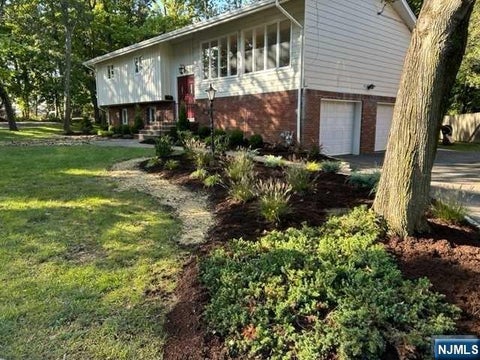 Photo of 32 Rock Rd, Englewood Cliffs, NJ 07632 (MLS # 26018927)