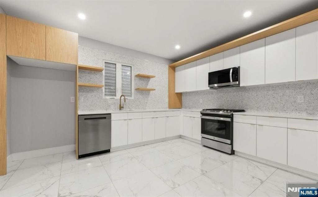 Photo of 104 Hollywood Avenue, East Orange, NJ 07018 (MLS # 25027459)