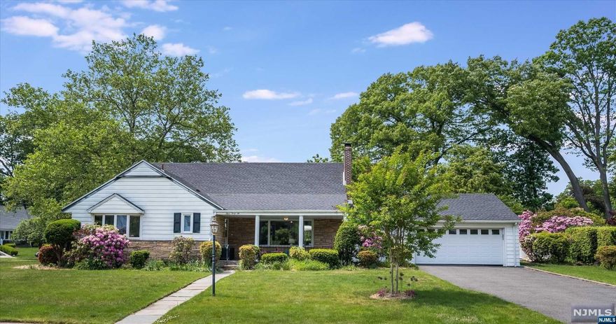 Beautifully updated 4 BR,3 1/2 bth home,perfectly located near Radburn's excellent NYC trans,parks,schools & shopping.Welcoming front porch leads to EF & on to a lrge LR w/fpl.Desirable open floor plan allows for semi-formal dining & leads to stunning new kitchen w/quartz counters w/seating & SS appls.Step outside to a fabulous patio-partially covered for hot summer days-overlooking the beautifully manicured,newly fenced yard.Back inside you'll find 3 of 4 BRs on the 1st level,incl 1 of the 2 primary suites & 2 gorgeous,renovated bths.Completing 1st level is a den & bright home office.Upstairs, 2nd primary BR suite w/stunning bath,huge walk-in cedar closet,& surprise bonus rm that makes a comfortable guest rm/office space.Lower level of this spacious home is accessed thru a sliding barn door leading to an enormous,retro styled rec rm & wet bar,updated PR, laundry rm & endless storage.New roof,c/air,2 car attached garage w/int access, UG sprinkler system + too many updates to list.