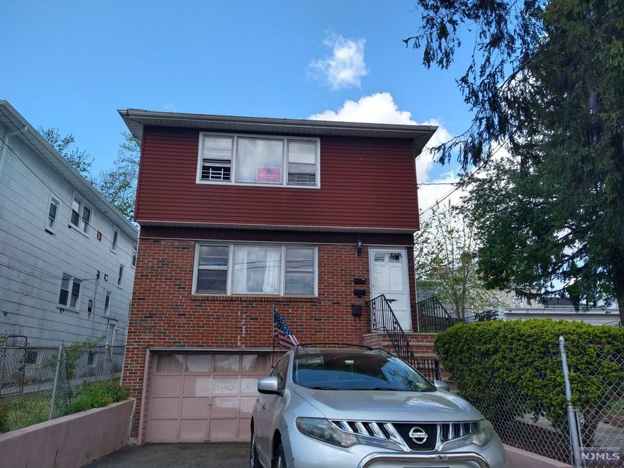 Located on a clean, quiet cul-de-sac this 2+bonus is a commuter's dream just 1 block from GSP & NYC Express Bus. Bright spacious rooms, real hardwood floors, large paved backyard patio w/small garden. Fully tenant occupied with 2nd Fl month-to-month. "As Is" sale. Location, location, location! House has great potential with a little TLC. All systems functional and well-maintained. Forced hot air. Newer water heater for 1 unit. Finished ground level with a full and half bath and 2 exits.