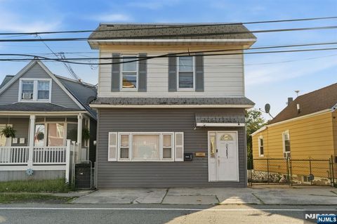 Photo of 397 River Drive, Garfield, NJ 07026 (MLS # 26026997)