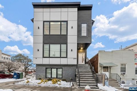 Photo of 299 Columbia Avenue, Jersey City, NJ 07307 (MLS # 26004304)