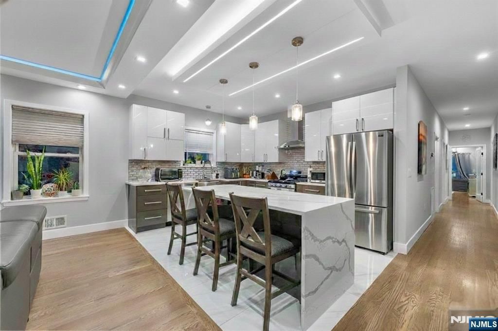 Photo of 299 Columbia Avenue, Jersey City, NJ 07307 (MLS # 26004304)