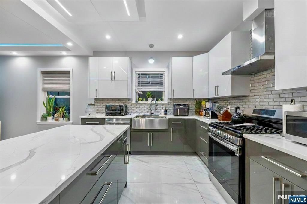 Photo of 299 Columbia Avenue, Jersey City, NJ 07307 (MLS # 26004304)