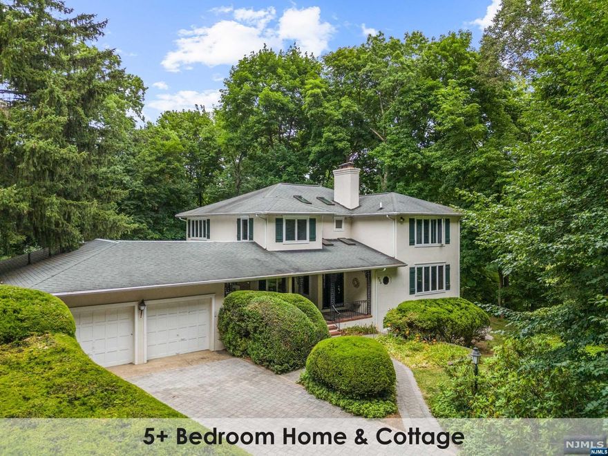 Nestled at the end of one of Ridgewood's most desirable & exclusive streets, lies a magical waterfront home with Guest Cottage & beautiful views. Surrounded by perennial mature plantings overlooking the Hohokus brook, this bespoke light drenched colonial lets the outside in with hallway skylights and large windows throughout. Set on a .63 acre with the outsized deck for easy entertaining, it has room for a pool, vegetable garden and/or a wildflower meadow. Inside boasts generous room sizes & an open floor plan. Lovely lower-level walk out space with its own BR/bath has separate entrance and leads to a private stone patio with the sound of running water. A special Guest Cottage with its own kitchen and bath is perfect for extended family, home office and more and truly sets this house apart. Spectacular private oasis in the heart of Somerville, close to schools, NYC train and downtown.