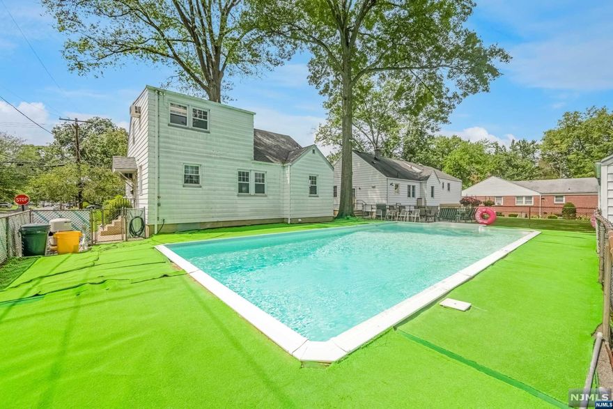 LOCATION! LOCATION! Large corner lot in quiet beautiful residential neighborhood on dead end street! This home has 4 bedrooms, 1 1/2 baths, large living room that opens to the dining area. Large finished basement with electric fireplace laundry room with newer washer, above ground oil tank, and storage, this home is professional landscaped with underground sprinklers. The backyard has a beautiful 20x40 inground pool, 1 car detached garage with remote garage door opener. attached shed, Close to house of worship, school and shopping. This home will sell AS IS.