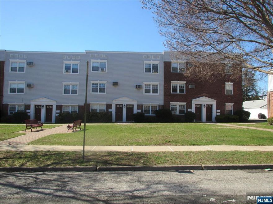 First-floor studio garden apartment featuring hardwood flooring throughout. The layout includes a combined living room and kitchen area, a separate dressing room or home office, and a full bathroom. Conveniently located near public transportation and the park. Rent includes heat, hot and cold water, and one outdoor parking space. A coin- and card-operated laundry facility is available on the premises. Board approval and a credit check are required. There is a $75 credit check fee and a $100 move-in/move-out fee. No pets permitted. Smoking is not allowed on the premises.