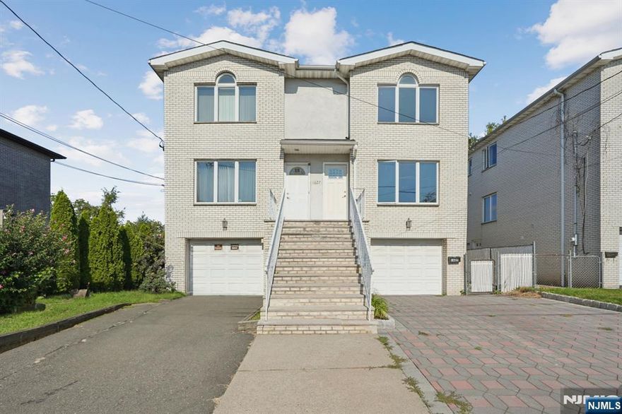 Completely renovated and move-in ready! This bright, southeast-facing duplex is situated on a serene block just minutes from the GWB. Step inside to discover an open floor plan with a brand new eat-in kitchen featuring custom cabinetry, new appliances, and direct access to a deck overlooking your fenced backyard - perfect for entertaining. Upstairs, youâ€™ll find 3 bedrooms and 2 full baths, including a primary suite. The finished lower level offers a full bath and flexible space that can serve as a guest suite, recreation room, home gym, or office. Modern updates throughout include a new roof, flooring, bathrooms, kitchen, and central AC. With 3 bedrooms, 3.5 bathrooms, and multiple living areas, this home is designed for todayâ€™s lifestyle. Conveniently located near NYC transportation, schools, restaurants, and the town center, this home combines comfort, style, and the quickest commute to Manhattan. Donâ€™t miss the chance to move right in and make this beautifully updated home your own!