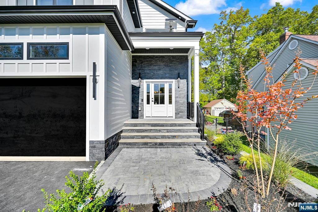 Photo of 74 Hillside Terrace, Livingston, NJ 07039 (MLS # 25037930)