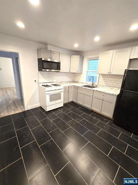Photo of 14 Triton Terrace, Newark, NJ 07104 (MLS # 26028059)
