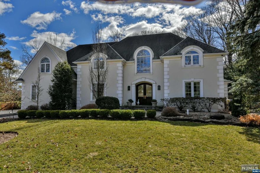 Spectacular showpiece home, w/elegant 2sty foyer, open staircase to 2 sty great rm/fpl & FDR. Newer custom 2sty Salerno kitchen, incl exquisite beams, top-of-the-line appliances incl subzero ref,LA Cornve stove & rostiserie, dbl islnd, farm sink. Bkfst rm overlooking park-like backyrd w/saltwater pool, spa, 2 waterfalls, koi pond, outdoor kit area, lush trees & landscaping create a private paradise to rest & relax or entertain! Sprawling 1st flr primary bedroom suite w/2 rms, either could be used as the bedroom or sitting rm depending on preference, one w/stunning copper ceiling & newly updated spa-like MBTH, plus addl private stair to LL for MBR access to lrg cedar clst, office, gym & wine room! 2nd flr boats another lrg ensuite BR w/FB & WIC, 2 addl spacious BRs w/hall bth & addl "bonus rm" for office/playrm w/storage. Lower level includes rec rm/game rm, wet bar area w/walk-in cigar clst, lndry & lrg storage rm. 3 Car gar,sprink,outdoor lghts . Just move right in and Enjoy!