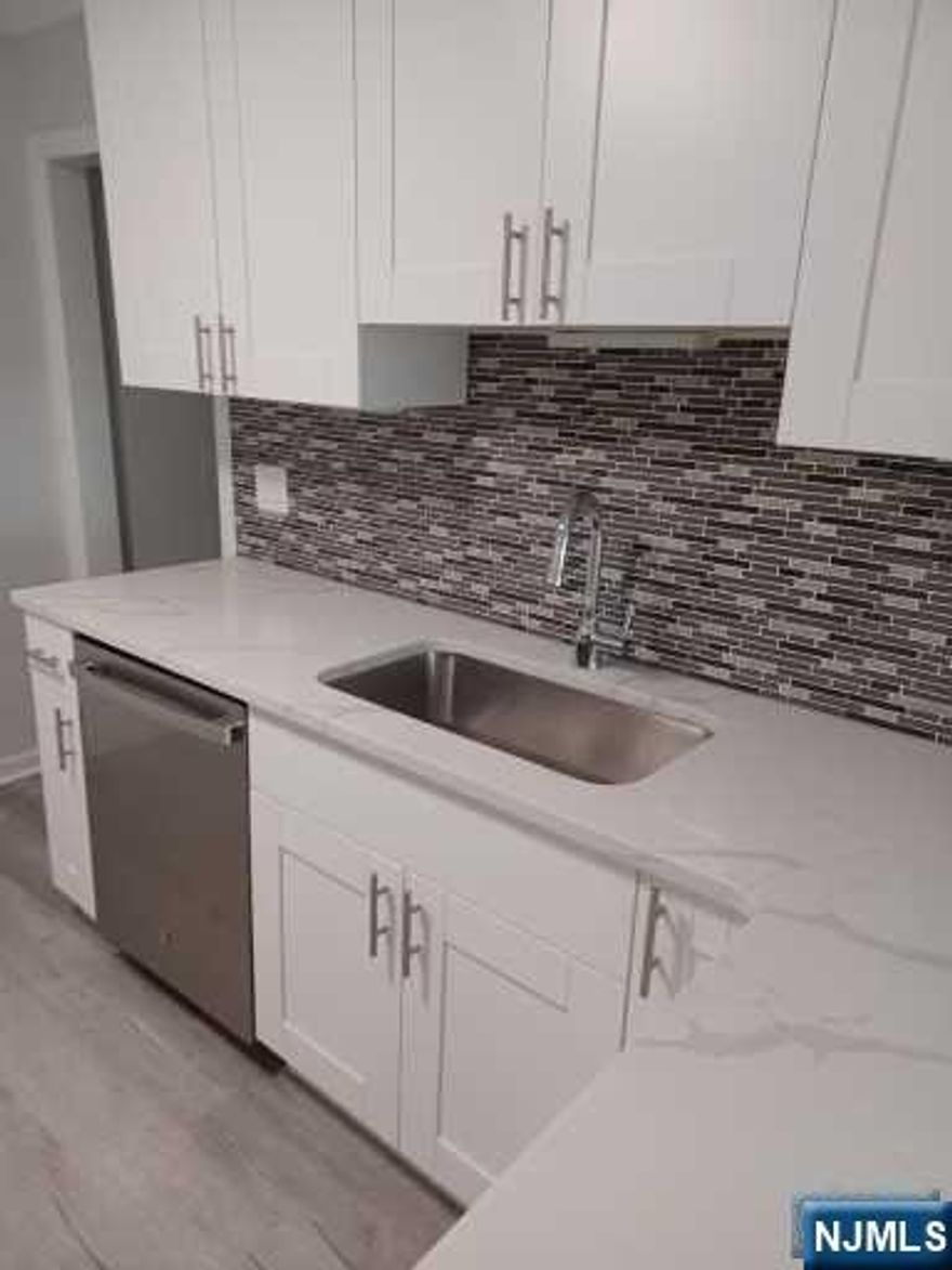 Gorgeous newly renovated large 2nd floor apartment available March 1st! Large living room, Large Dining Area, Master bedroom with laundry hookups! Brand new kitchen with all new stainless steel appliances with a nice sized pantry! Brand new bathroom with tub, glass enclosure! 2nd bedroom away from master ...Extra bonus room...great for office, den, or sitting room! This is private, use of one parking space, schedule will be given! Must have renters insurance. Animals may be accepted! Non-Smoking Building