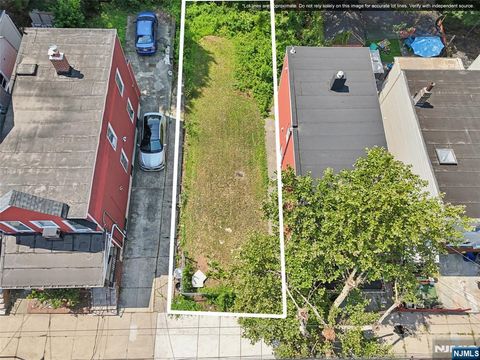 Photo of 297 Claremont Avenue, Jersey City, NJ 07305 (MLS # 25029123)