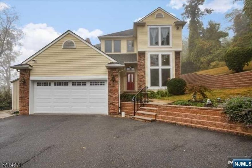 Impressive Colonial style home with contemporary flair that sits back from the road for additional privacy... enjoy spacious open rooms, soaring ceilings, beautiful kitchen with abundant Hickory cabinetry & pantry plus side desk area, newer SS appliances, Corian counters & granite island & separate breakfast area...all open to family room with gas start, brick wall fireplace, new 4 panel slider to new trex style deck... formal DR 2 story Living Room.. this level provides laundry room, office/exercise room, storage & garage access... Primary BR suite includes high ceiling, full bath w/Jacuzzi tub & separate shower & walk-in closet, 2 additional BR's on this level w/main bath including skylite! So many new improvements include new Andersen & Pella windows & slider throughout, 3 yr CAC, new carpet, many rooms freshly painted, hi-hat lighting, ceiling fans, new garage door, full house generator, fenced yard, concrete pad for RV or boat.. and so much more.. Not to be missed!