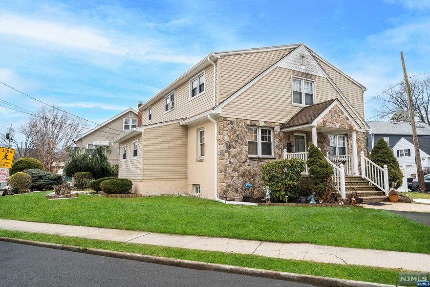 Discover the warmth and coziness of this beautiful, south facing, 2-family home on a corner lot, perfectly nestled in Woodland Park, NJ. This unique property boasts a fully fenced-in yard, a detached garage, and separate entryways for each unit. The owner-occupied unit shines with an abundance of natural sunlight, featuring a spacious living and dining area, an updated kitchen, and a delightful sunroom. It includes 2 bedrooms, 2 full bathrooms, and access to a massive fully finished basement. The second-floor unit offers a large kitchen, a spacious living room, and 3 comfortable bedrooms, making it ideal for multi-generational or rental income. Both units can enjoy access to a fantastic, backyard, perfect for outdoor enjoyment and gatherings. Centrally located to all major highway, transit, parks, schools, shopping center and so much more.