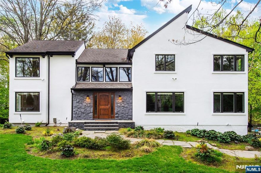 Stunning Updated Franklin Lakes Home for Rent in a Premier Location! This beautifully renovated contemporary Center Hall Colonial offers luxury, space, and modern upgrades throughout. Featuring 5 spacious bedrooms, including a convenient first-floor bedroom with a full bath, plus 3 full and 1 half baths. Enjoy elegant living with a formal Living Room, Dining Room, soaring cathedral-ceiling Great Room, and a gourmet oversized kitchen with center island, perfect for entertaining. This exceptional home also includes a fully finished walk-out basement, 3-car garage, in-ground pool, central air, central vacuum, and underground sprinklers. Updated finishes and high-end improvements can be found throughout the entire home, blending timeless style with modern comfort. Located in one of Franklin Lakesâ€™ most desirable areas with top-rated schools. Luxury living at its finest!