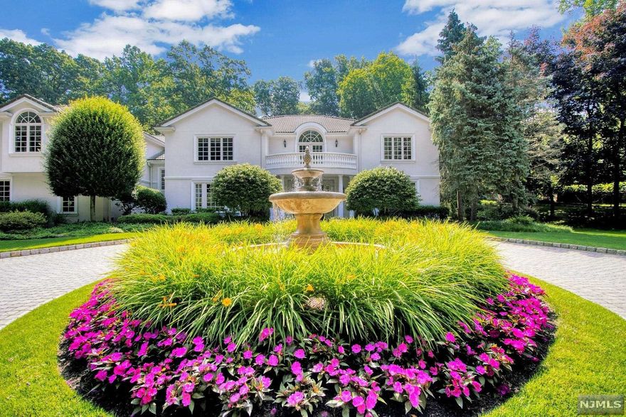 THIS ELEGANT GATED ESTATE IS MAJESTICALLY SITUATED ON TWO LUSH ACRES OF BREATHTAKING GROUNDS. A DISTAULO DESIGNED CUSTOM BUILT HOME OF THE FINEST QUALITY. ENTER THE GRAND ENTRANCE FOYER THAT FLOWS EFFORTLESSLY INTO THE STUNNING LIBRARY & BANQUET DINING RM W/BUTLER'S PANTRY. THE OVERSIZED LIVING RM AND FAMILY RM W/FPLC & BAR OVERLOOK AND ACCESS THE MAGNIFICENT OUTDOORS. ENJOY THE EXPANSIVE CUSTOM GOURMET KITCHEN REPLETE WITH PROFESSIONAL APPLIANCES AND LARGE BRKFST AREA. GRACIOUS GALLERY HALLWAYS AND FRONT AND BACK STAIRCASES TAKE YOU TO THE LUXURIOUS PRIMARY SUITE W/FLPC, SITTING RM, WALK-IN CLOSETS, DRESSING RM AND BATH. THREE ADD'L EN SUITE BEDROOMS ALONG WITH TWO ADD'L BEDROOMS/BONUS RM/GYM W/JACK & JILL BATH COMPLETE THE SECOND FLOOR. FABULOUS LOWER LEVEL RECREATION AREA, FULL KITCHEN, BEDROOM, FBATH, GOLF SIMULATOR/MEDIA RM, WALK OUT TO THE GUNITE POOL W/SPA AND FABULOUS OUTDOOR ENTERTAINING AREA W/BUILT IN BARBEQUE. EQUIPT WITH A HOUSE GENERATOR. JUST MINUTES FROM MANHATTAN!