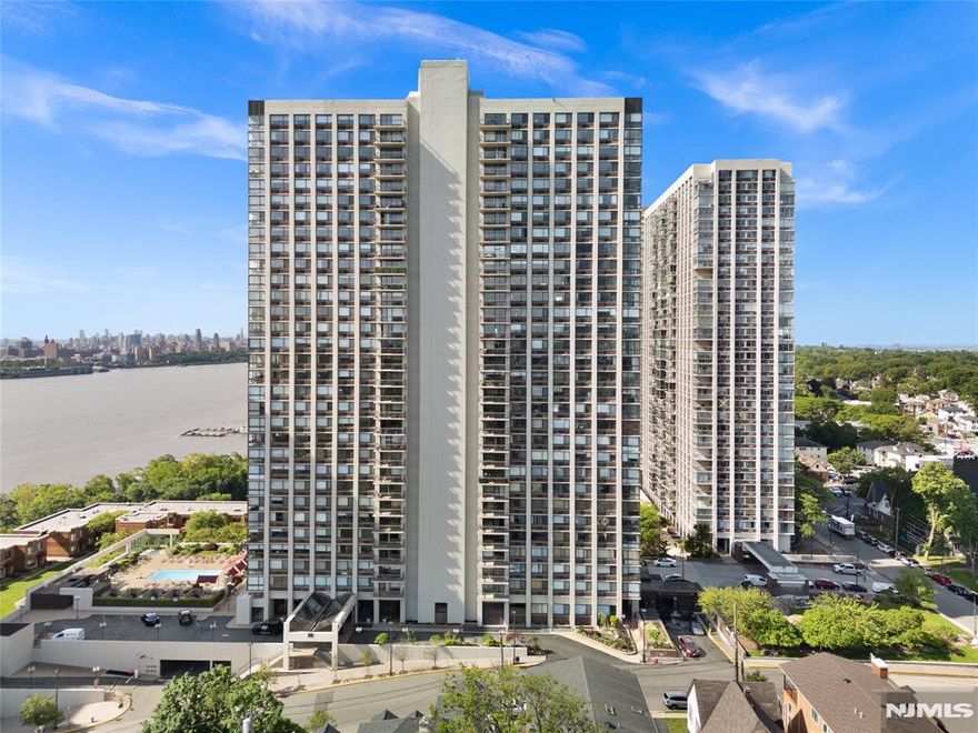 Welcome to your new luxury escape, offering one of the most coveted views in the city. This expansive 1-bedroom, 1.5-bath home has been beautifully updated and is highlighted by an enormous private terrace overlooking the Hudson River and the iconic George Washington Bridgeâ€”a true entertainer's dream. Residents enjoy a white-glove, full-service experience with a 24-hour concierge, a premium health club, valet parking, a seasonal outdoor pool, and a community BBQ area. Practical luxury includes one deeded indoor garage parking space (#284). The unit is offered in "As Is" condition and the special assessment has been paid in full.