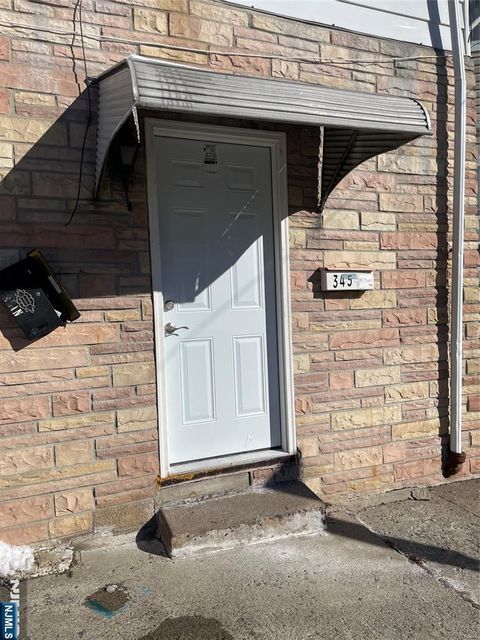 Photo of 345 Sussex St, Paterson, NJ 07503 (MLS # 26003340)