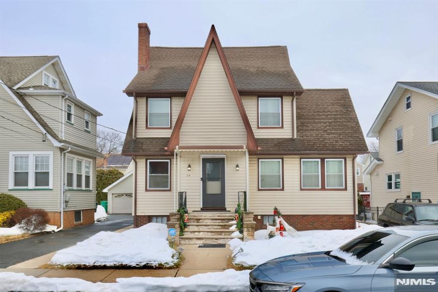 Welcome to this beautifully maintained Colonial in the heart of Belleville, where timeless charm, comfort, and functionality come together seamlessly.This exceptional 3-bedroom, 2 full-bath home offers a well-designed layout ideal for both everyday living and entertaining. Each bedroom is generously sized and filled with natural light, providing comfortable and private retreats throughout the home.The main living area features a warm and inviting atmosphere, highlighted by a cozy fireplace that serves as the focal point of the living room perfect for relaxing evenings or gathering with guests. The home flows effortlessly from room to room, offering a balance of openness and defined living spaces.The fully finished basement adds tremendous versatility, ideal for a recreation room, home office, gym, or media space, while a dedicated storage room keeps everything organized. A bonus attic provides additional storage or future potential.Outside, the property continues to impress with an oversized detached garage offering ample parking, storage, or workshop space. The metal fencing enhances both security and curb appeal, creating a well-defined and attractive outdoor setting.Conveniently located near parks, schools, shopping, dining, and major commuting routes, this home offers the perfect blend of comfort and accessibility.This is more than just a house it's a place to truly call home.