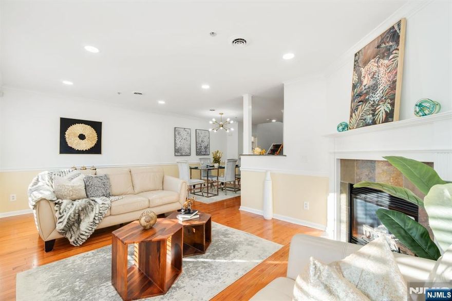 Welcome to this beautifully maintained and highly sought-after "Grover Cleveland townhome, offering three spacious levels of stylish living!The first floor features gleaming hardwood floors, an open-concept layout, and a beautifully updated kitchen with granite countertops and a large pantry. The dining area flows seamlessly into the inviting living room, complete with a cozy gas fireplace. A convenient powder room rounds out this level.Upstairs, you'll find a spacious family room with access to a private covered balcony perfect for relaxing or entertaining. The luxurious primary suite includes double sinks, a large custom walk-in closet, and an en suite bath. A second bedroom, full hallway bath, and a full-size laundry room with ample counter space complete the second level.The oversized finished basement offers incredible flexibility ideal for a third bedroom, home office, gym, or playroom.PRIME LOCATION! Just minutes from top-rated schools, shops, restaurants, and NYC transportation. WALKING DISTANCE TO DOWNTOWN CALDWELL AND MONTCLAIR with access to train service into NYC.Don't miss this opportunity to live in comfort and style with unbeatable convenience!