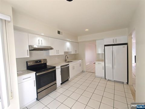 Photo of 1533 John St, Fort Lee, NJ 07024 (MLS # 26009984)