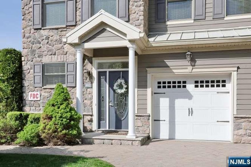 Welcome to this highly desirable end-unit at The Whitney in Allendale. Ideally positioned in a premium location with serene wooded views, this light filled 2-bedroom, 2-bath residence offers an open-concept layout designed for todayâ€™s lifestyle. Move-in ready and thoughtfully updated, this Dogwood model features a sun-drenched LR and DR that opens to the large kitchen. The spacious primary bedroom offers a private balcony overlooking wooded views, two custom closets, and an en-suite bath which has been recently updated with a new vanity, light fixtures, & mirrors. The fully renovated main bath has Dolomite Carrara marble flooring. The kitchen combines style and functionality with a center island with raised counter, granite countertops, and ample workspace. Additional improvements include pre-finished wood floors in the bedrooms, new deck, and a finished lower level currently used as a home theater/flex space. One-car attached garage. Located within the gated community of The Whitney, residents enjoy access to a clubhouse, outdoor pool, fitness center, and playground. Conveniently situated near top-rated schools, shopping, dining, and NYC transportation including bus and rail access. Don't miss this rare opportunity to own this beautifully updated carriage home in one of Allendaleâ€™s most sought-after communities.