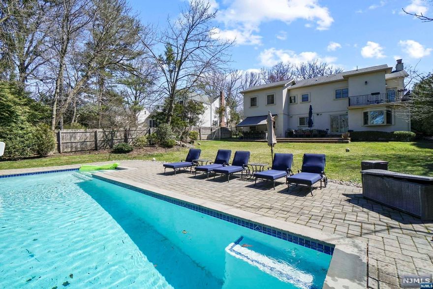 BEAUTIFUL COLONIAL ON A QUIET CUL DE SAC STREET ON THE EAST HILL OF TENAFLY. COMPLETELY RENOVATED IN 2012, THIS HOUSE HAS IT ALL. FIRST FLOOR - FORMAL LIVING ROOM, FORMAL DINING ROOM, EAT-IN KITCHEN WITH BREAKFAST AREA, FAMILY ROOM, POWDER ROOM AND SLIDING DOOR TO THE BEAUTIFUL BACK YARD. SECOND FLOOR - PRIMARY BEDROOM, PRIMARY BATH WITH RADIANT HEATED FLOOR, LARGE WALK-IN CLOSET AND A BALCONY OVERLOOKING THE BACK YARD. JUNIOR SUITE WITH FULL BATHROOM AND RADIANT HEATED FLOOR, BONUS ROOM, BEDROOM, FULL BATHROOM, BEDROOM, LAUNDRY. BASEMENT - FINISHED WITH GUEST ROOM, FULL BATHROOM, MEDIA AREA. OUTDOORS - IN-GROUND HEATED SWIMMING POOL, NEWER OUTDOOR KITCHEN, SPACIOUS FENCED-IN YARD. MINUTES TO THE GEORGE WASHINGTON BRIDGE TO MANHATTAN, EXCELLENT SCHOOLS AND CLOSE TO DOWNTOWN TENAFLY. OWNER HOLDS A NJ REAL ESTATE LICENSE.