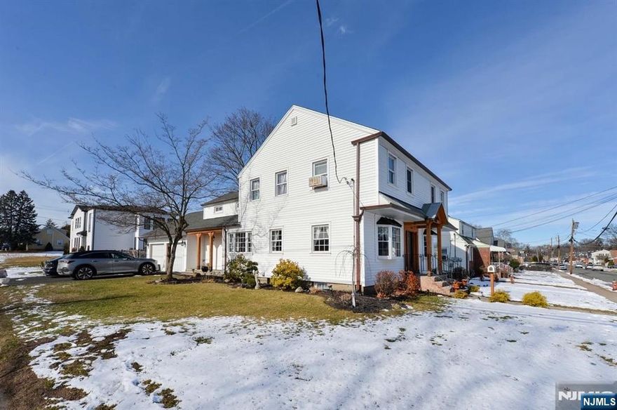 This beautifully sun-filled 4-bedroom, 2.5 full-bath residence blends timeless comfort with modern luxury designed for comfort. From the moment you enter, rich hardwood floors lead you through sun-filled living spaces that feel both warm and elevated. The heart of the home is a stunning, brand-new chef's kitchen, thoughtfully finished with granite countertops, stainless steel appliances, and a Sub-Zero refrigerator. 2.5 newly renovated full baths offer spa-like finishes and a sense of calm, while the spacious primary suite provides a private retreat at the end of the day. Additional bedrooms are generously sized, filled with natural light, and ready to adapt to your lifestyle, whether work-from-home, guests, or growing needs. Main living areas are warm, inviting enhanced by recessed lighting and a fireplace. Basement offers a charming rustic vibe perfect for a media room, gym, play space, or creative studio. Storage is abundant, with extensive attic space and a rare double-size garage. Outside, enjoy a fully fenced yard ideal for entertaining, relaxing, or simply enjoying quiet moments outdoors. With a newer roof and new siding, updated electrical on the first floor and new insulation through-out. All of this is set within Fair Lawnâ€™s highly regarded school district, known for strong academic performance and community pride and just minutes from parks, shopping, dining, and major commuting routes. Seller is offering 50,000 toward installation of central air conditioning.